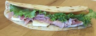 5 - Cotto, brie, salsa tartufata, rucola
