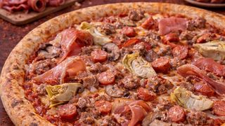 Pizza tonda  esagerata