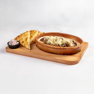 Pikantni uštipci u kajmak sosu