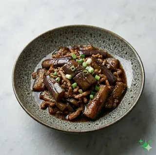 Melanzana saltato con maiale e salsa di soia