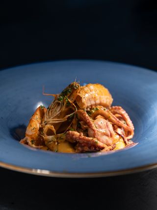 I polipetti affogati con polenta fritta