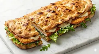 Saltimbocca cotoletta provola insalata  