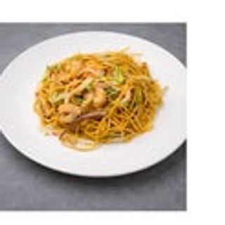 Spaghetti saltati con frutti di mare e verdure