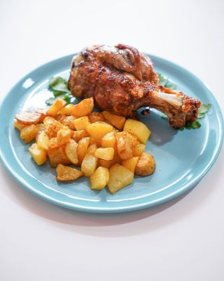 Stinco di maiale con patate