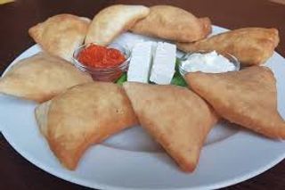 Uštipci sa kajmakom i sirom