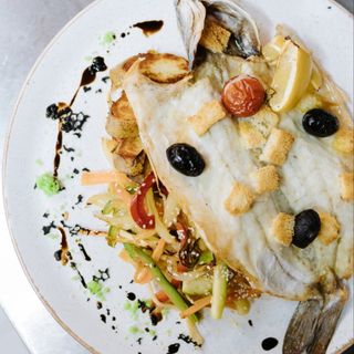 Brancin iz krušne peći na površu iz wok-a i pekarskim krompirom 350g