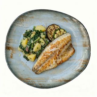 Filet brancina na dalmatinskoj garnituri