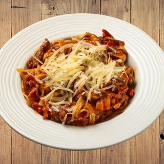 Талиатели с прошуто, гъби и сушени домати