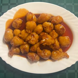 94.Панирано свинско месо в кисело-сладък сос (700г)