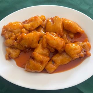 169.Панирана риба в сладко кисел сос (600г)