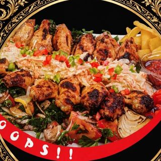 Порция пилешки крила на жар-голяма