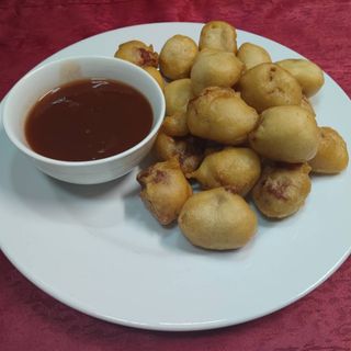 35. Свински панирани хапки със сладко-кисел сос (700гр)