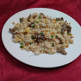 122. Пържен ориз със свинско и яйца (700гр)