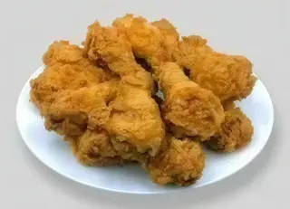 Панирани пилешки бут (1кг)
