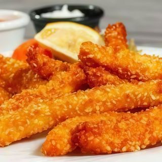 Хрупкави пилешки пръчици със сусам (250г)