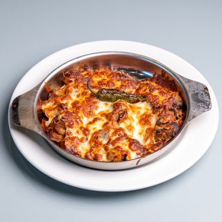Свинско бон филе в саханче с лук и гъби / Pork tenderloin in a clay dish with onion and mushrooms