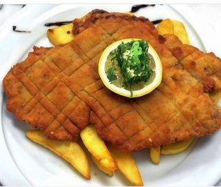 91.Свински шницел по виенски (350г)