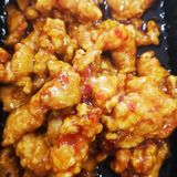 91.Панирано свинско сладко-кисел сос (500г)