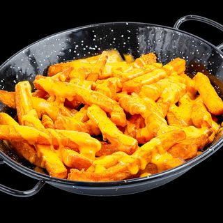 Хрупкав батат с чедър и трюфел пудра