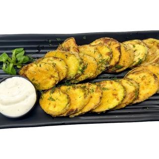 Тиквички по гръцки с млечен сос