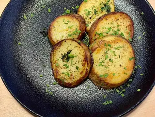 Гарнитура Печени билкови картофки (200гр.)