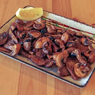 Телешки език с гъби в масло