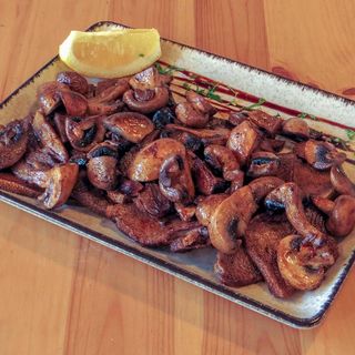 Телешки език с гъби в масло