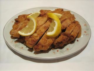 126. Панирано пилешко с лимон (600г)
