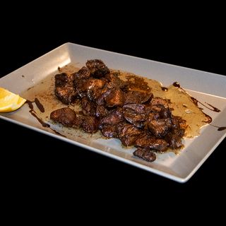 Пилешки сърца в масло