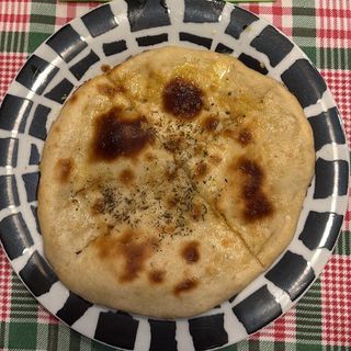Пърленка с масло и чесън