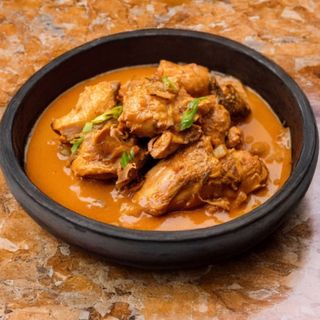 Kedjenou 1/4 de poulet + riz