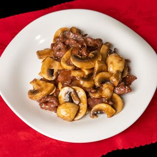 Ternera con champiñones