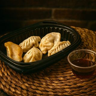DUMPLINGS A LA PLANCHA (5 uds.)