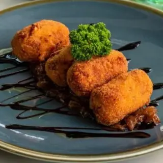 Ración De Croquetas Caseras
