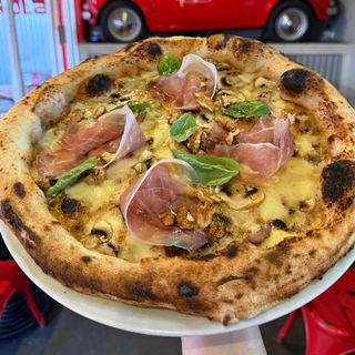 Pizza especial “LA RUCOLITA”