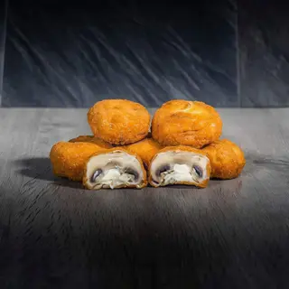 Champiñones rellenos de queso