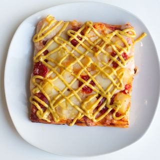 Pizza Bravas (Porción)