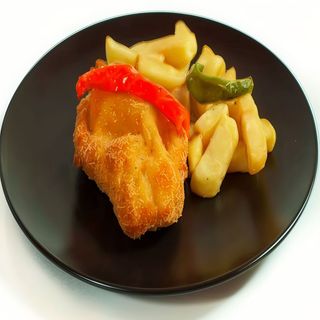 Pechuga empanada con york y queso