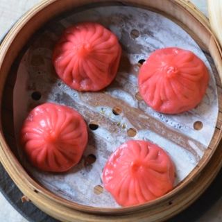 9E Xiaolongbao de cerdo con caldo sabor picante