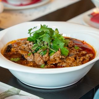 Lonchas de ternera en salsa picante
