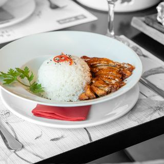 Arroz blanco con pato asado