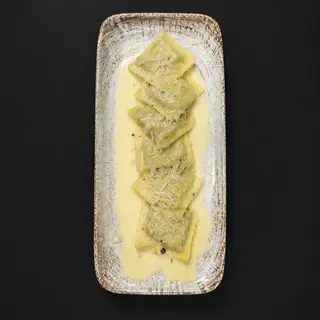 Ravioloni con spinaci e ricotta di capra al profumo di agrumi