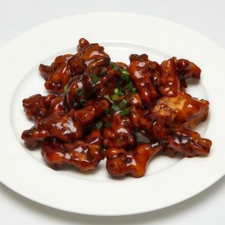 #64 Solomillo de cerdo caramelizado con salsa agridulce singapur