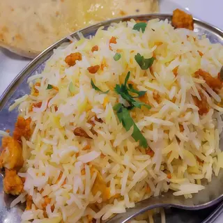 Biryani con pollo