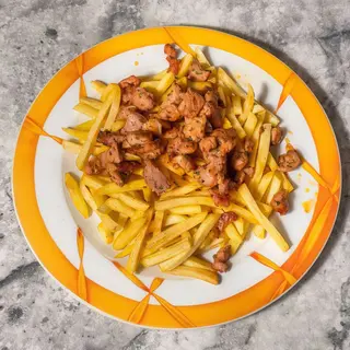 Raxo con patatas