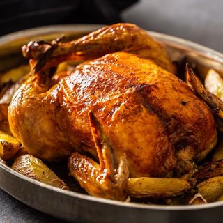 Pollo asado (1.3 kg.) con su caldo