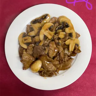 Ternera con champiñones