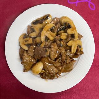 Ternera con champiñones