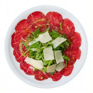 Carpaccio de ternera morucha con parmesano y aceite de oliva VE