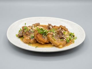 Patatas a la importancia con almendras tostadas